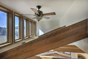 ceiling fan above rafters