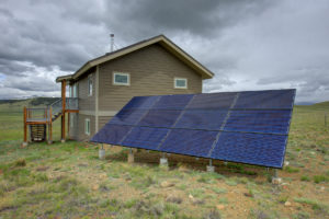 home from behind, showing solar panels