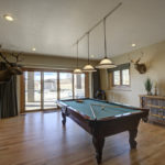 52.jpg game room pool table door outside