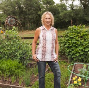 Helene standing in garden