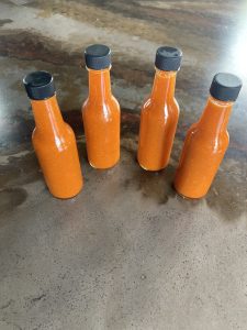 jars of pepper sauce