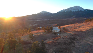 rising sun by the Spanish Peaks