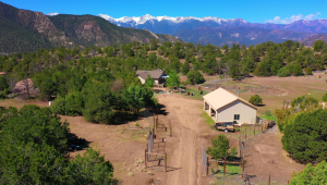 panoramic view of house and garage