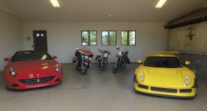 Ferrari & Noble in garage