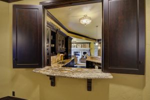 bar service window to theater room