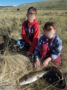 kids with fish