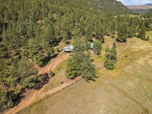 view of cabin and garage