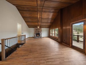 living room and wood floors and ceiling