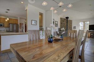 dining room with living room behind
