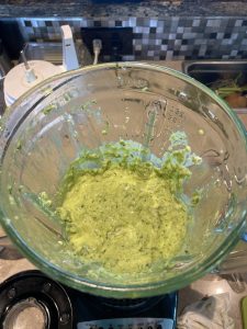 Blender with pesto sauce