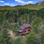 aerial view house with mtns
