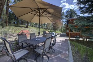 outdoor dining table and umbrella