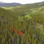 Aerial Cabin with Skyline Up Valley w arrow